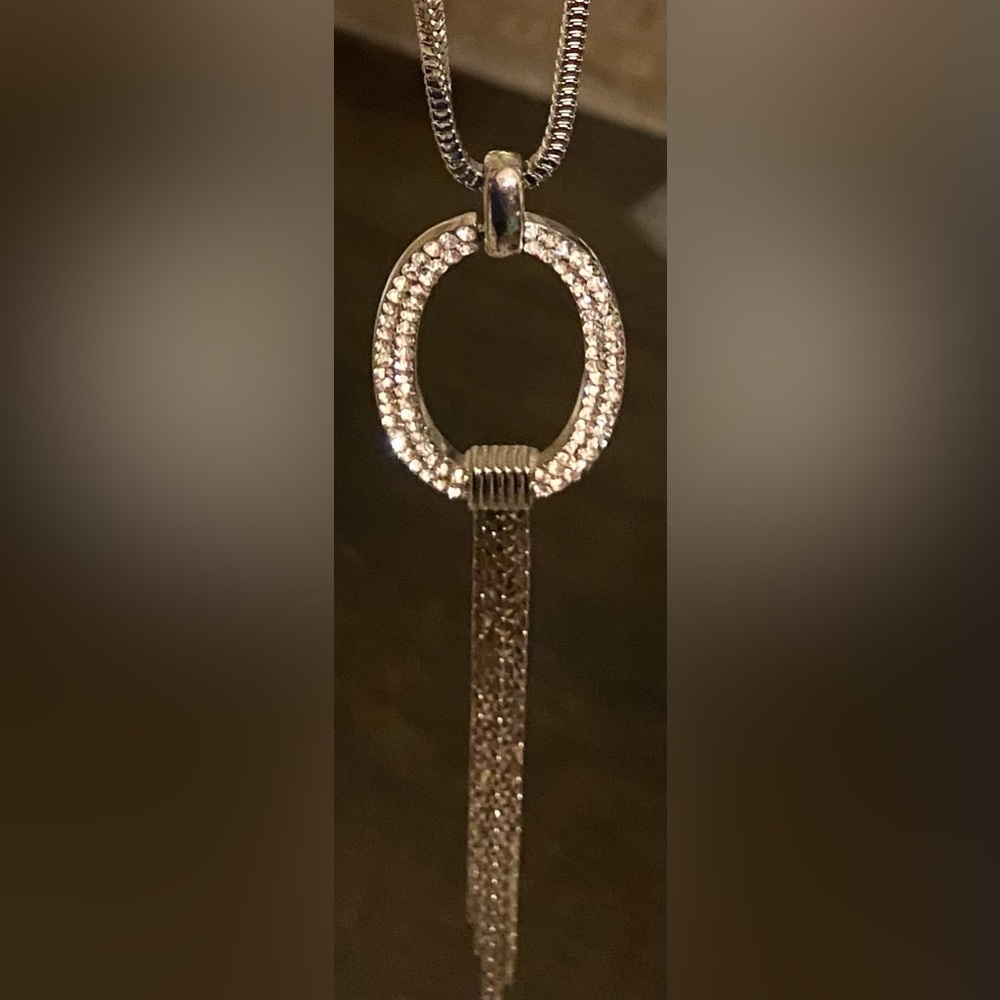 Silver and rhinestone necklace.
